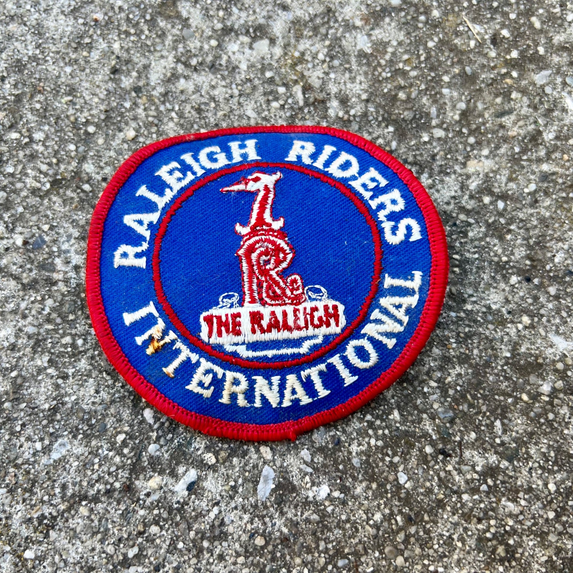Raleigh Riders International Vintage Patch 3” Diameter Blue Red Retro Road Bike