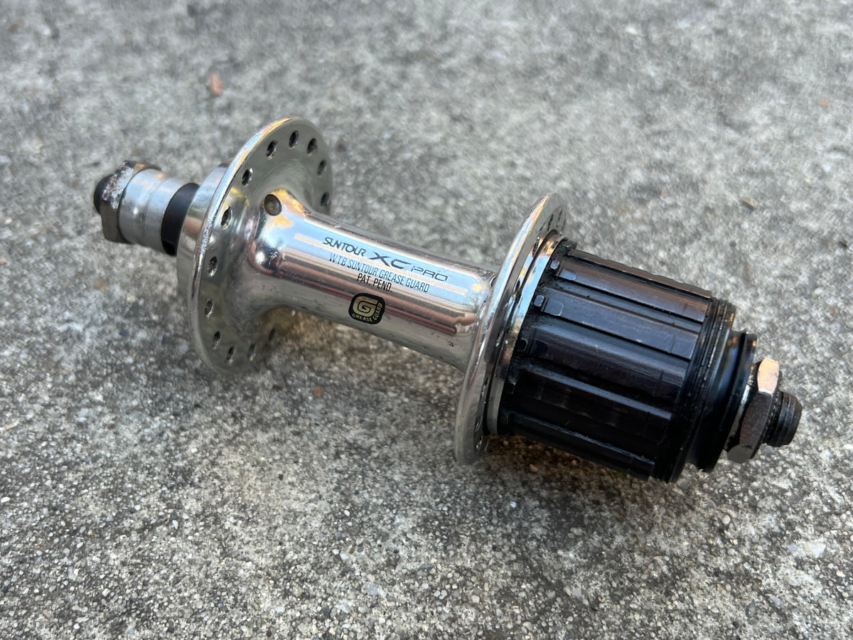 Suntour XC PRO 32H 135mm WTB Greaseguard Microdrive MD Rear Hub MTB