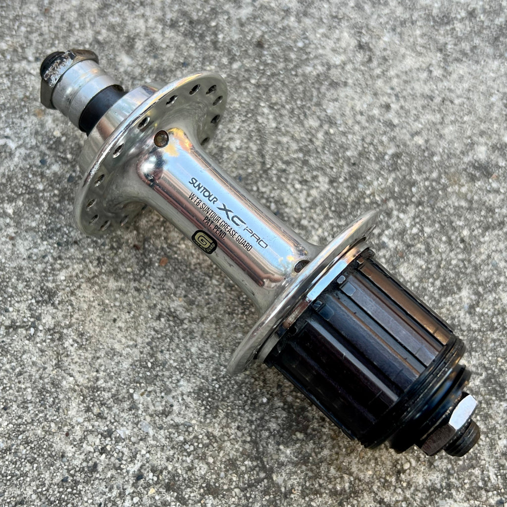 Suntour XC PRO 32H 135mm WTB Greaseguard Microdrive MD Rear Hub MTB